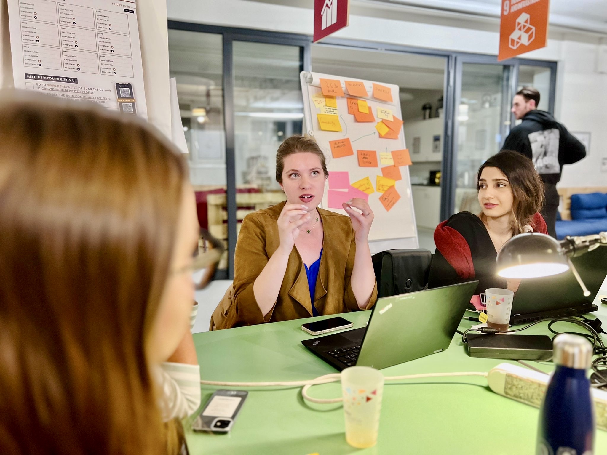 The team of participants brainstorming solutions to tackle Giga's challenge